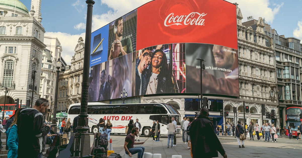 coca cola advertisment on a billboard